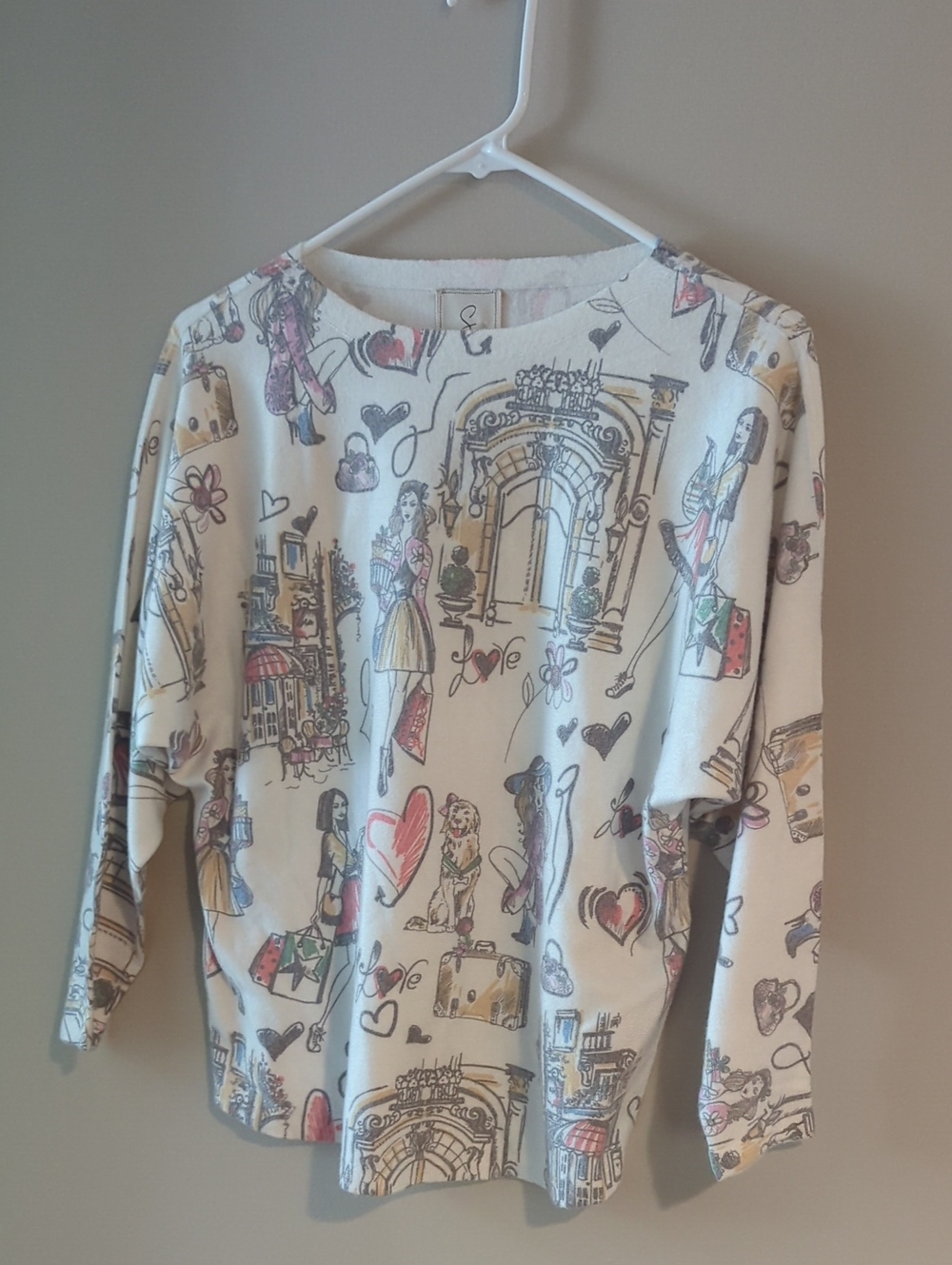 Sioni - NWT- Cream Long Sleeve Top with Chic Illustrations